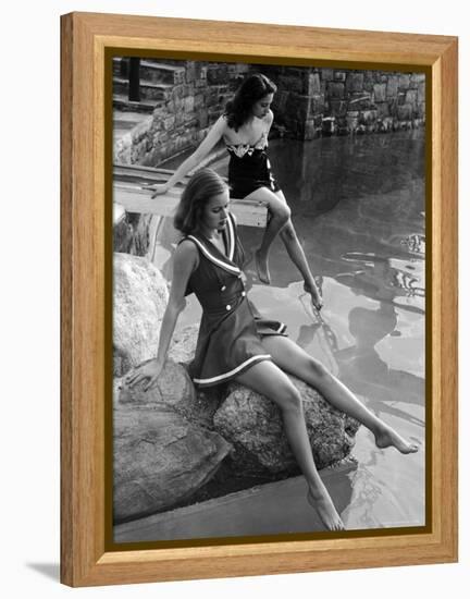 Pair of Models Showing Off New Bathing Suits on the Banks of the River-Nina Leen-Framed Premier Image Canvas