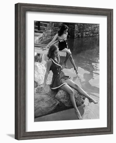 Pair of Models Showing Off New Bathing Suits on the Banks of the River-Nina Leen-Framed Photographic Print
