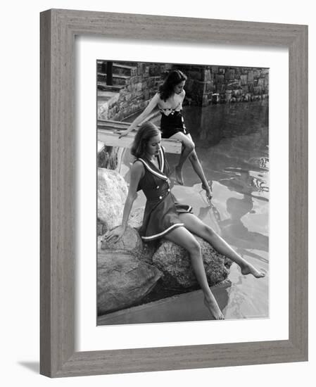 Pair of Models Showing Off New Bathing Suits on the Banks of the River-Nina Leen-Framed Photographic Print