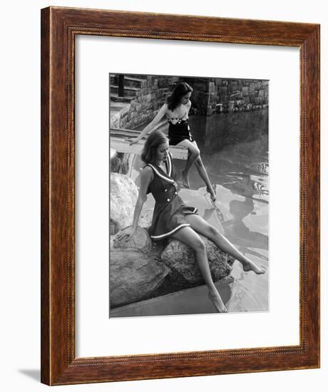 Pair of Models Showing Off New Bathing Suits on the Banks of the River-Nina Leen-Framed Photographic Print