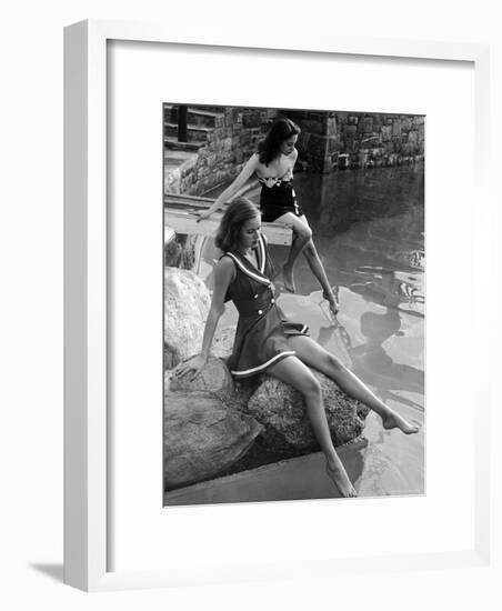 Pair of Models Showing Off New Bathing Suits on the Banks of the River-Nina Leen-Framed Photographic Print