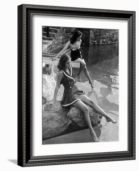 Pair of Models Showing Off New Bathing Suits on the Banks of the River-Nina Leen-Framed Photographic Print