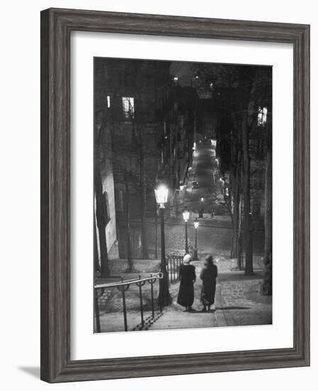 Pair of Prostitutes Descending Stairs after Dark in Montmartre-Alfred Eisenstaedt-Framed Photographic Print