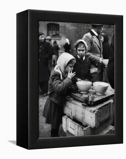 Pair of Russian Children Having a Meal of Molasses Bread and Coffee in a Displaced Persons Camp-null-Framed Premier Image Canvas