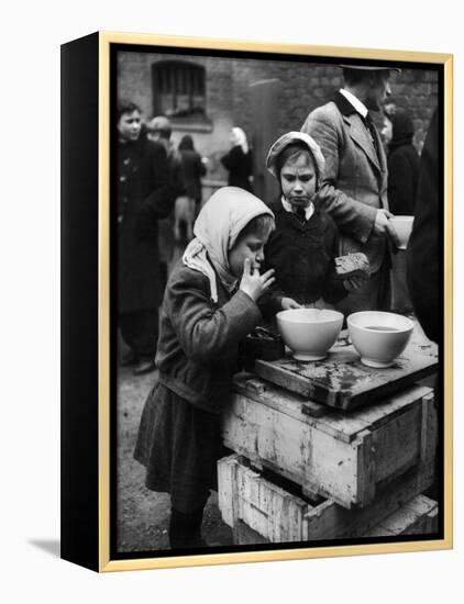 Pair of Russian Children Having a Meal of Molasses Bread and Coffee in a Displaced Persons Camp-null-Framed Premier Image Canvas