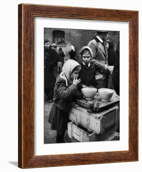 Pair of Russian Children Having a Meal of Molasses Bread and Coffee in a Displaced Persons Camp-null-Framed Photographic Print