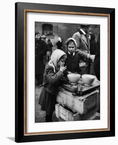 Pair of Russian Children Having a Meal of Molasses Bread and Coffee in a Displaced Persons Camp-null-Framed Photographic Print