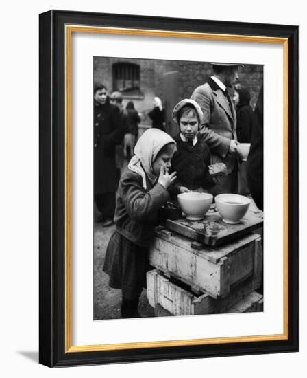 Pair of Russian Children Having a Meal of Molasses Bread and Coffee in a Displaced Persons Camp-null-Framed Photographic Print