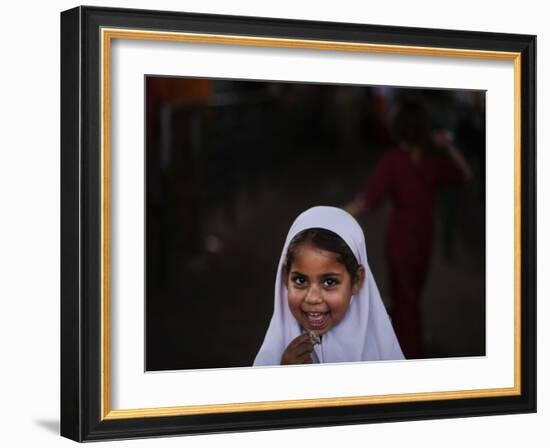 Pakistani Girl Waits for Her Mother to Get Rice During a Donated Food Distribution at the Beri Iman-null-Framed Photographic Print