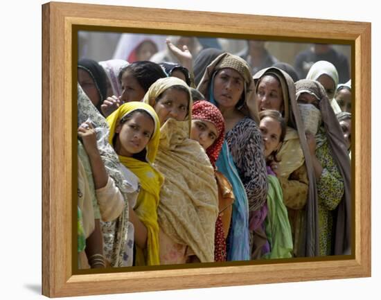 Pakistani Women Queue Up to Get Subsidized Sacks of Flour for the Holy Month of Ramadan-null-Framed Premier Image Canvas