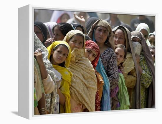 Pakistani Women Queue Up to Get Subsidized Sacks of Flour for the Holy Month of Ramadan-null-Framed Premier Image Canvas