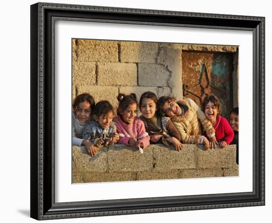 Palestinian Girls Giggle While Photographed Where Shell from an Israeli Gunboat Landed Earlier-null-Framed Photographic Print