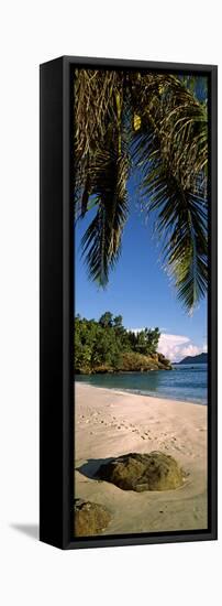 Palm Trees and Rocks on a Small Secluded Beach on North Island, Seychelles-null-Framed Stretched Canvas