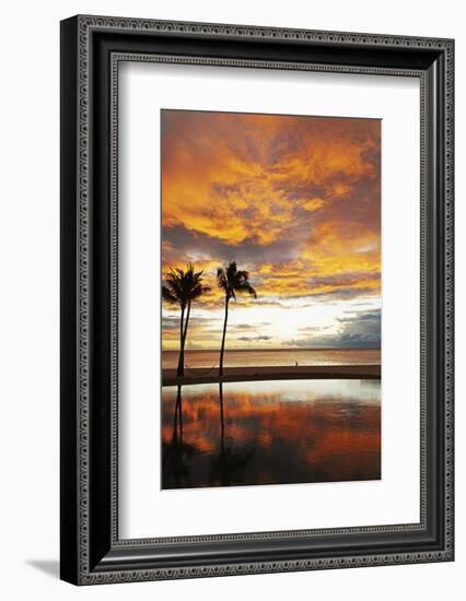 Palm trees silhouetted against red clouds during sunset over a beach at Flic en Flac-Stuart Forster-Framed Photographic Print