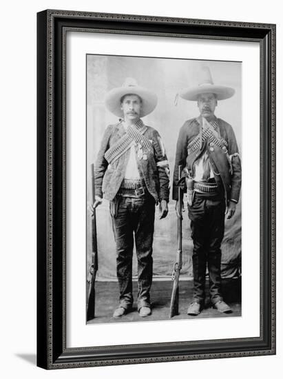 Pancho Villa's Men Urbino and Iluarte Stand at Attention with Rifles, Bandoliers and Pistols-null-Framed Art Print