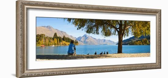Panorama of Tourist Relaxing by Lake Wakatipu in Autumn at Queenstown, Otago, New Zealand-Matthew Williams-Ellis-Framed Photographic Print