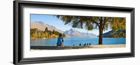 Panorama of Tourist Relaxing by Lake Wakatipu in Autumn at Queenstown, Otago, New Zealand-Matthew Williams-Ellis-Framed Photographic Print