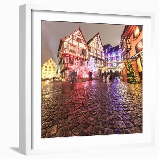 Panorama of typical houses enriched by Christmas ornaments and lights at dusk, Colmar, Haut-Rhin de-Roberto Moiola-Framed Photographic Print