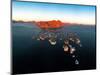 Panoramic aerial view of the fishing village of Henningsvaer and mountains at sunset-Roberto Moiola-Mounted Photographic Print