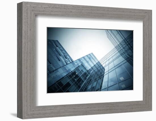 Panoramic and Perspective Wide Angle View to Steel Blue Background of Glass High Rise Building-Vladitto-Framed Photographic Print