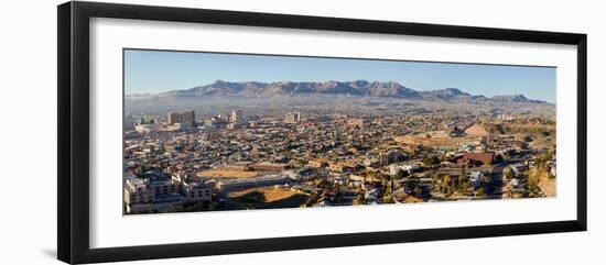 Panoramic view of skyline and downtown of El Paso Texas looking toward Juarez, Mexico-null-Framed Photographic Print