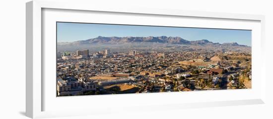 Panoramic view of skyline and downtown of El Paso Texas looking toward Juarez, Mexico-null-Framed Photographic Print