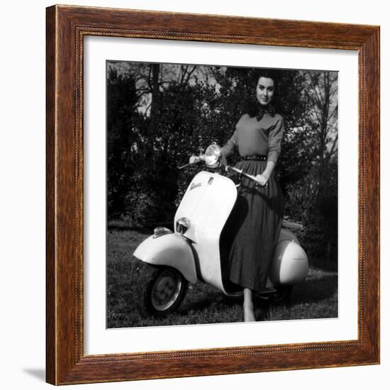 Paola Mori on a Vespa During Her Honeymoon with Orsonwelles in South of France, May 1955-null-Framed Photo