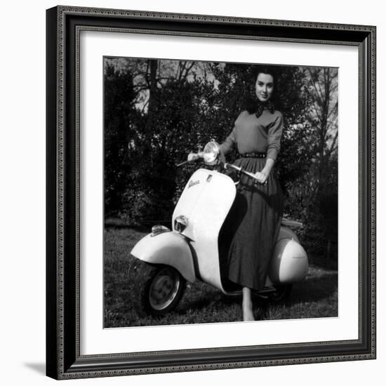 Paola Mori on a Vespa During Her Honeymoon with Orsonwelles in South of France, May 1955-null-Framed Photo