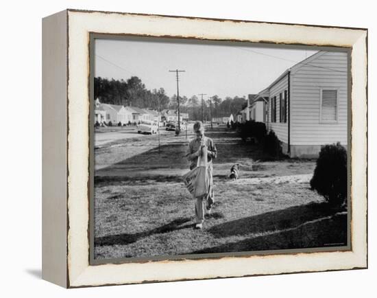 Paper Boy Delivering Newspapers in His Neighborhood-Ed Clark-Framed Premier Image Canvas