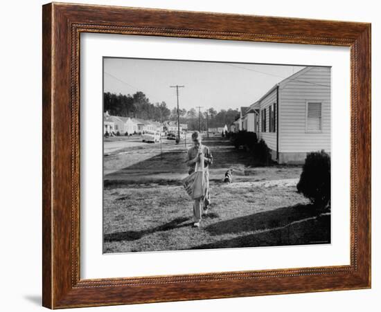 Paper Boy Delivering Newspapers in His Neighborhood-Ed Clark-Framed Photographic Print