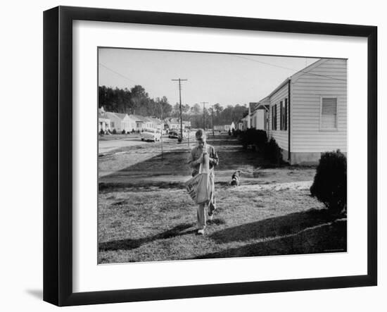 Paper Boy Delivering Newspapers in His Neighborhood-Ed Clark-Framed Photographic Print