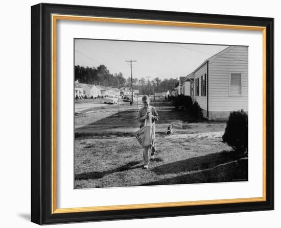 Paper Boy Delivering Newspapers in His Neighborhood-Ed Clark-Framed Photographic Print