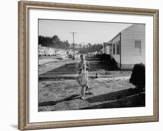 Paper Boy Delivering Newspapers in His Neighborhood-Ed Clark-Framed Photographic Print