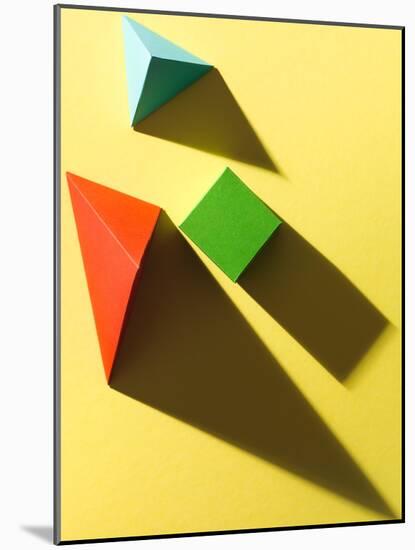 Paper Cube and Pyramids with Harsh Shadow on Yellow Background-Abstract Oil Work-Mounted Photographic Print