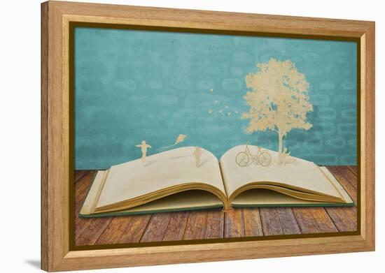 Paper Cut of Children Play on Old Book-jannoon028-Framed Premier Image Canvas