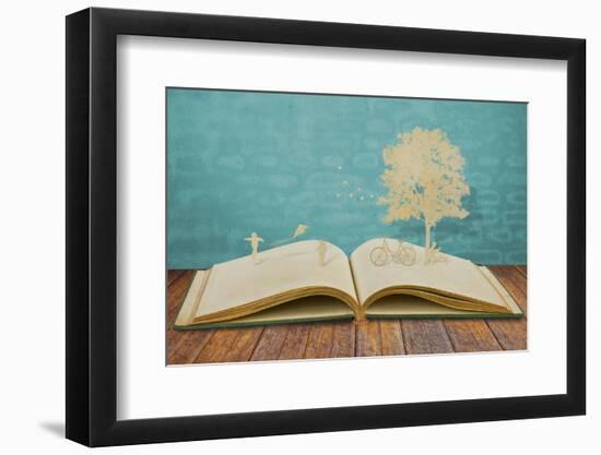 Paper Cut of Children Play on Old Book-jannoon028-Framed Photographic Print