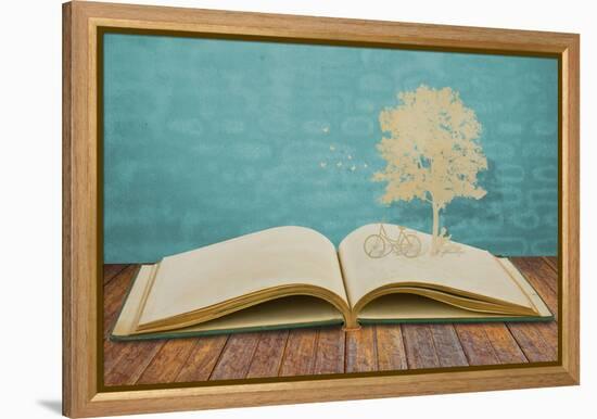 Paper Cut Of Children Read A Book Under Tree On Old Book-jannoon028-Framed Stretched Canvas