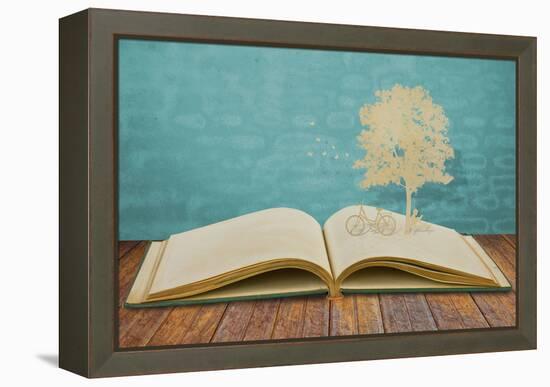 Paper Cut Of Children Read A Book Under Tree On Old Book-jannoon028-Framed Stretched Canvas