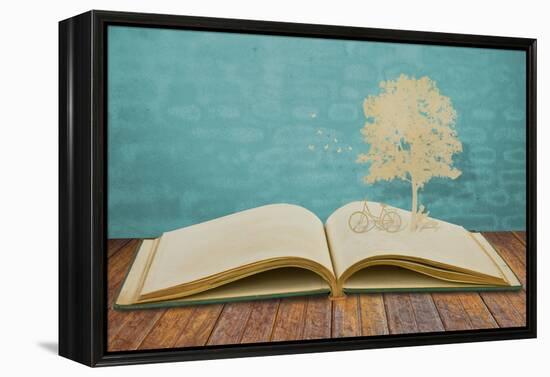 Paper Cut Of Children Read A Book Under Tree On Old Book-jannoon028-Framed Stretched Canvas