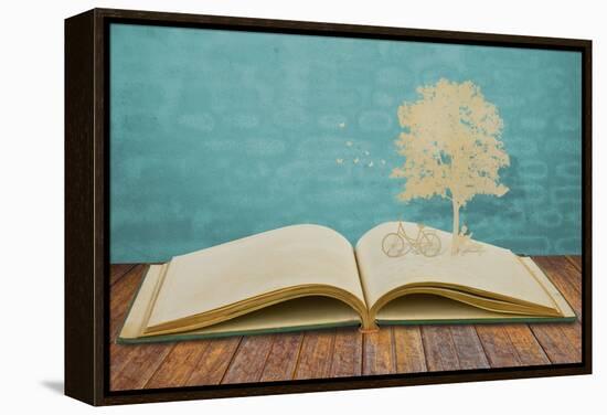 Paper Cut Of Children Read A Book Under Tree On Old Book-jannoon028-Framed Stretched Canvas