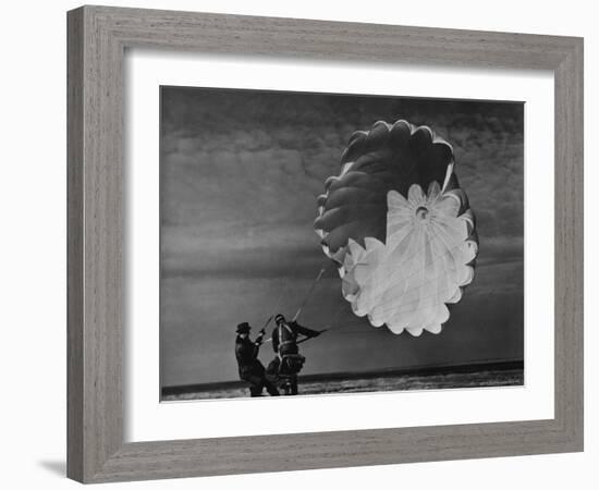 Parachute Jumper Testing Equipment for the Irving Air Chute Co. Gets Some Help-Margaret Bourke-White-Framed Photographic Print