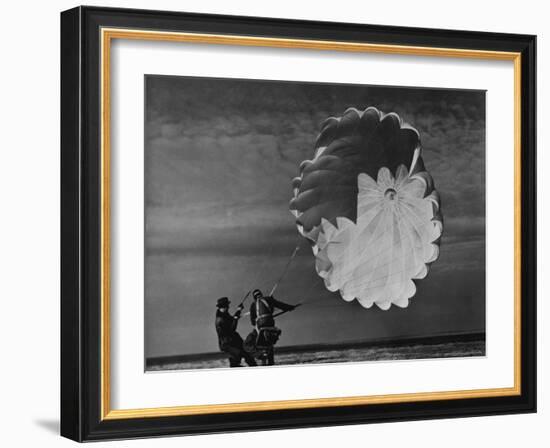 Parachute Jumper Testing Equipment for the Irving Air Chute Co. Gets Some Help-Margaret Bourke-White-Framed Photographic Print