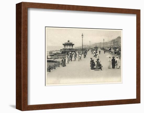 Parasols are Carried by Many Holidaymakers on the Promenade at Brighton-null-Framed Photographic Print