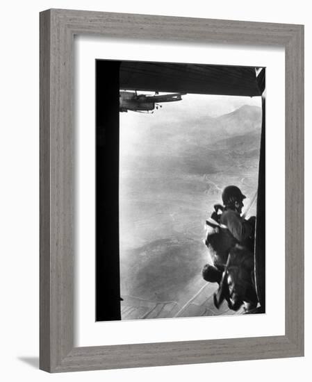 Paratrooper Making Way to Jump Off a Military Plane into Hostile Territories-John Dominis-Framed Photographic Print