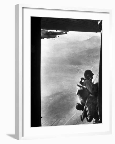 Paratrooper Making Way to Jump Off a Military Plane into Hostile Territories-John Dominis-Framed Photographic Print