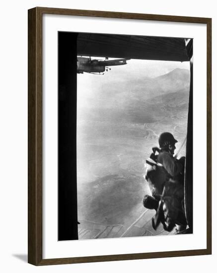 Paratrooper Making Way to Jump Off a Military Plane into Hostile Territories-John Dominis-Framed Photographic Print