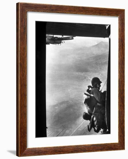 Paratrooper Making Way to Jump Off a Military Plane into Hostile Territories-John Dominis-Framed Photographic Print