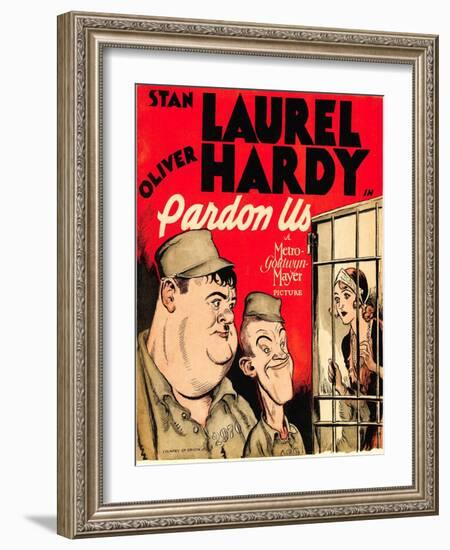 PARDON US, from left: Oliver Hardy, Stan Laurel on window card, 1931.-null-Framed Art Print