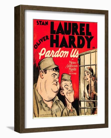 PARDON US, from left: Oliver Hardy, Stan Laurel on window card, 1931.-null-Framed Art Print