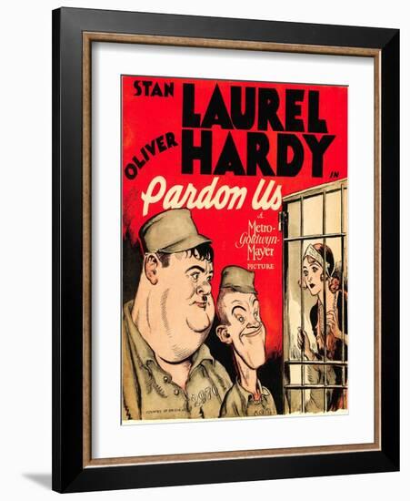 PARDON US, from left: Oliver Hardy, Stan Laurel on window card, 1931.-null-Framed Art Print